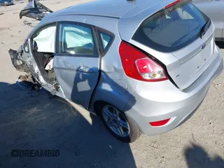 2018 Ford Fiesta SE with VIN 3FADP4EJ1JM114972, listed as a IAAI auction lot 41254391 with 28,114 mi miles and . Bid and sale history available at carsss.com. Image 3.