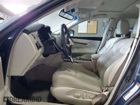 2012 Infiniti M Hybrid with VIN JN1EY1AP1CM910773, listed as a Copart auction lot 56379845 with 168,626 mi miles and Clean title. Bid and sale history available at DreamBid. Image 7.