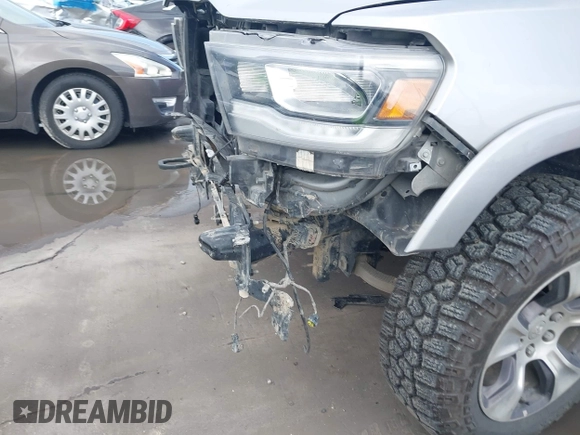 2019 Ram 1500 Laramie with VIN 1C6SRFJT8KN686506, listed as a IAAI auction lot 42499382 with 145,287 mi miles and . Bid and sale history available at DreamBid. Image 18.