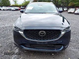 2023 Mazda CX-5 Signature with VIN JM3KFBXY4P0153335, listed as a IAAI auction lot 40053867 with 17,828 mi miles and . Bid and sale history available at carsss.com. Image 12.