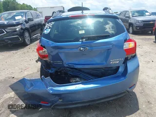 2014 Subaru Impreza Special Sports Premium z VIN JF1GPAL61E8225316, wystawiony jako IAAI lot #42252802 z przebiegiem 95 794 mil mil oraz . Historia ofert i sprzedaży dostępna na DreamBid. Obrazek 16.