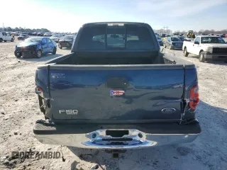 2002 Ford F-150 XLT with VIN 1FTRW07L52KA67609, listed as a Copart auction lot 87720715 with 177,615 mi miles and Salvage Title. Bid and sale history available at carsss.com. Image 6.