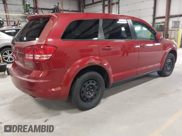 2009 Dodge Journey SXT with VIN 3D4GG57V39T587354, listed as a IAAI auction lot 41989290 with 102,250 mi miles. Bid and sale history available at carsss.com. Image 4.