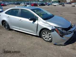 2021 Toyota Corolla LE with VIN JTDEPMAE3MJ120538, listed as a IAAI auction lot 41850150 with 90,998 mi miles. Bid and sale history available at carsss.com. Image 1.