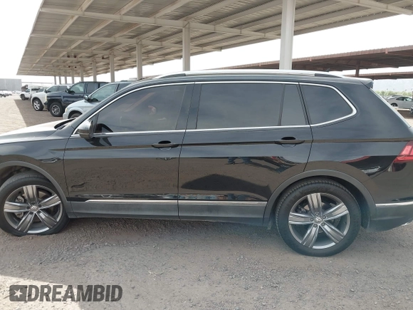 2020 Volkswagen Tiguan SE z VIN 3VV3B7AX7LM039084, wystawiony jako IAAI lot #42249016 z przebiegiem 126 763 mil mil oraz . Historia ofert i sprzedaży dostępna na DreamBid. Obrazek 14.