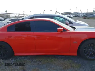 2020 Dodge Charger Scat Pack z VIN 2C3CDXGJ1LH221572, wystawiony jako IAAI lot #41286078 z przebiegiem 67 514 mil mil oraz . Historia ofert i sprzedaży dostępna na DreamBid. Obrazek 13.