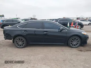 2015 Toyota Avalon Limited with VIN 4T1BK1EB9FU142315, listed as a IAAI auction lot 41579567 with 135,391 mi miles and . Bid and sale history available at DreamBid. Image 14.