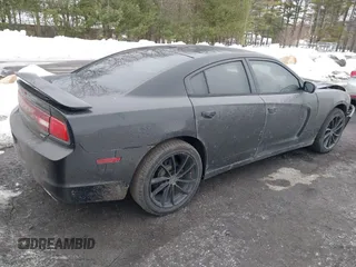2014 Dodge Charger SXT Plus with VIN 2C3CDXJG2EH163049, listed as a IAAI auction lot 41634369 with 1 mi miles. Bid and sale history available at carsss.com. Image 4.