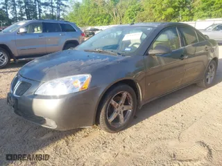 2006 Pontiac G6 GT with VIN 1G2ZH578164171631, listed as a IAAI auction lot 41945854 with 137,457 mi miles. Bid and sale history available at carsss.com. Image 2.