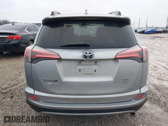 2018 Toyota RAV4 XLE with VIN 2T3RFREV1JW842728, listed as a IAAI auction lot 41519668 with 149,670 mi miles. Bid and sale history available at carsss.com. Image 16.
