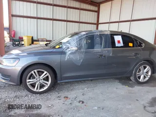 2014 Volkswagen Passat SE z VIN 1VWBN7A32EC059503, wystawiony jako IAAI lot #40876045 z przebiegiem Nie podano mil oraz . Historia ofert i sprzedaży dostępna na DreamBid. Obrazek 7.