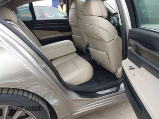 2012 BMW 7 Series 740i with VIN WBAKA4C51CC613670, listed as a IAAI auction lot 41582639 with 149,753 mi miles. Bid and sale history available at carsss.com. Image 8.