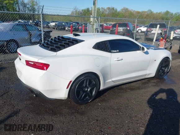 2017 Chevrolet Camaro 1LT with VIN 1G1FA1RX6H0136098, listed as a IAAI auction lot 41978704 with 136,637 mi miles and . Bid and sale history available at carsss.com. Image 4.