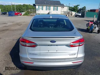 2019 Ford Fusion Titanium with VIN 3FA6P0RUXKR141565, listed as a IAAI auction lot 42323999 with 206,397 mi miles and . Bid and sale history available at DreamBid. Image 17.