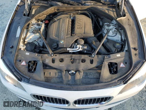 2015 BMW 7 Series 740Li with VIN WBAYE4C59FD139044, listed as a Copart auction lot 75907584 with 113,587 mi miles and Salvage Title. Bid and sale history available at DreamBid. Image 13.