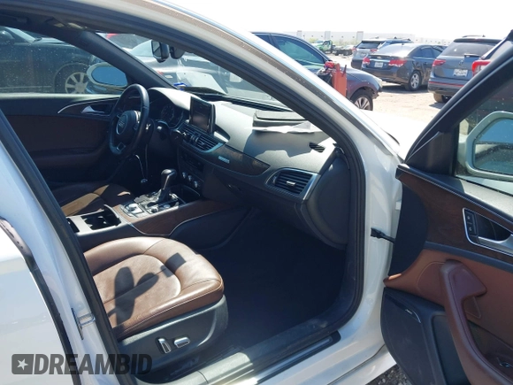 2016 Audi A6 2.0T Premium Plus with VIN WAUGFAFC4GN045229, listed as a IAAI auction lot 41974532 with 122,585 mi miles. Bid and sale history available at carsss.com. Image 5.