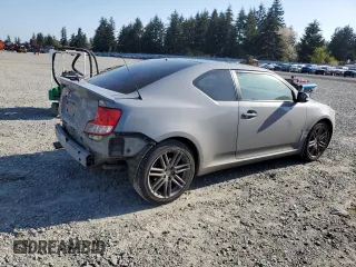 2011 Scion tC with VIN JTKJF5C76B3000765, listed as a Copart auction lot 53954445 with 243,554 mi miles and Salvage Title. Bid and sale history available at carsss.com. Image 3.