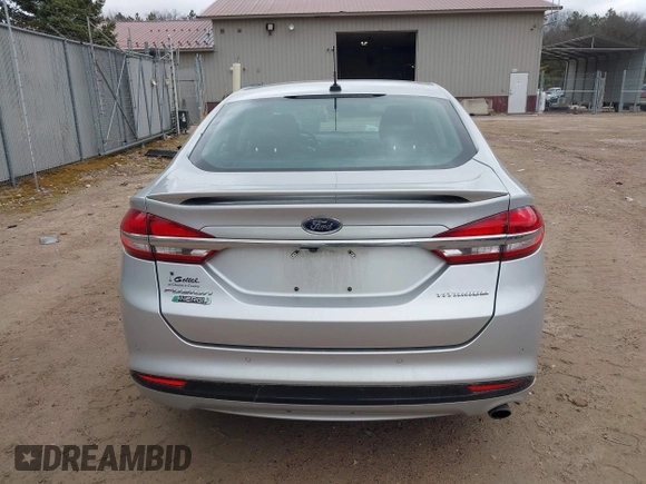 2017 Ford Fusion Titanium with VIN 3FA6P0SU2HR153423, listed as a IAAI auction lot 42029438 with 106,596 mi miles and . Bid and sale history available at DreamBid. Image 16.