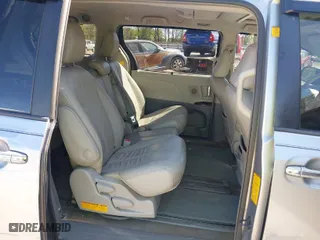 2012 Toyota Sienna XLE AAS with VIN 5TDYK3DC8CS257542, listed as a IAAI auction lot 42061520 with 166,449 mi miles. Bid and sale history available at carsss.com. Image 8.