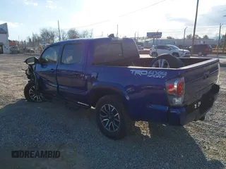 2023 Toyota Tacoma 4WD SR with VIN 3TYCZ5AN1PT119133, listed as a IAAI auction lot 41574906 with 19,887 mi miles. Bid and sale history available at carsss.com. Image 3.