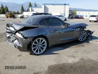 2014 BMW Z4 sDrive35i with VIN WBALM7C50EE385780, listed as a Copart auction lot 74046914 with 88,766 mi miles and Salvage Title. Bid and sale history available at carsss.com. Image 3.