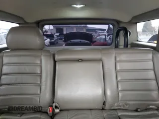 2003 Hummer H2 z VIN 5GRGN23U43H137876, wystawiony jako Copart lot #48081145 z przebiegiem 128 703 mil mil oraz Tytuł czysty. Historia ofert i sprzedaży dostępna na DreamBid. Obrazek 10.