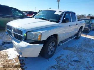 2005 Dodge Dakota Laramie with VIN 1D7HE58N35S138912, listed as a IAAI auction lot 41359470 with 263,136 mi miles. Bid and sale history available at carsss.com. Image 2.