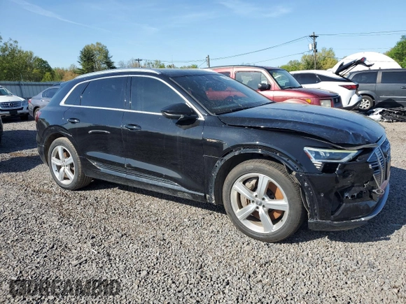 2019 Audi e-tron Premium Plus with VIN WA1LABGE5KB013142, listed as a Copart auction lot 52452085 with 91,042 mi miles and Salvage title. Bid and sale history available at DreamBid. Image 4.