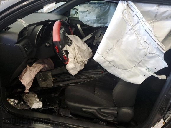 2013 Scion tC with VIN JTKJF5C76D3060385, listed as a Copart auction lot 50183935 with 186,886 mi miles and Salvage Title. Bid and sale history available at carsss.com. Image 7.