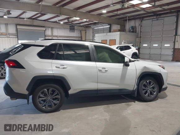 2023 Toyota RAV4 Hybrid XLE Premium with VIN JTMB6RFV2PD089104, listed as a IAAI auction lot 42645439 with 43,535 mi miles and . Bid and sale history available at DreamBid. Image 13.