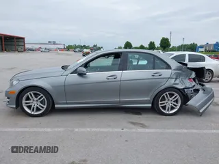 2014 Mercedes-Benz C 250 Sport with VIN WDDGF4HB6EG160494, listed as a IAAI auction lot 42310423 with 145,160 mi miles and . Bid and sale history available at DreamBid. Image 14.