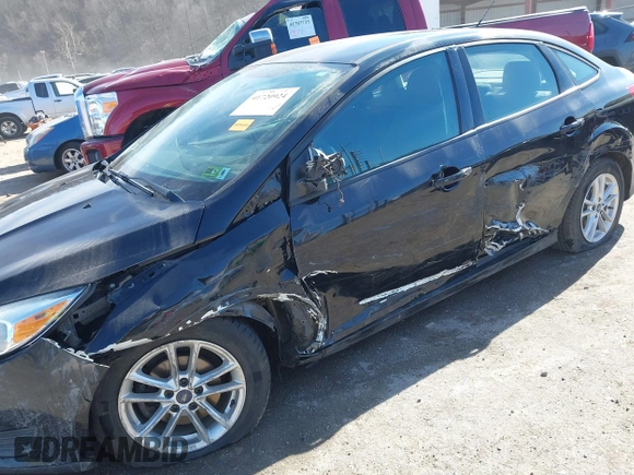 2016 Ford Focus SE with VIN 1FADP3F29GL304823, listed as a IAAI auction lot 41720924 with 82,245 mi miles. Bid and sale history available at carsss.com. Image 6.