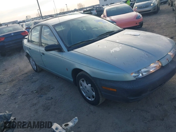 1997 Saturn SL with VIN 1G8ZH528XVZ196784, listed as a IAAI auction lot 41662187 with 112,278 mi miles. Bid and sale history available at carsss.com. Image 1.