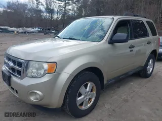 2011 Ford Escape XLT with VIN 1FMCU9D70BKA77676, listed as a IAAI auction lot 41921757 with 288,545 mi miles. Bid and sale history available at carsss.com. Image 2.