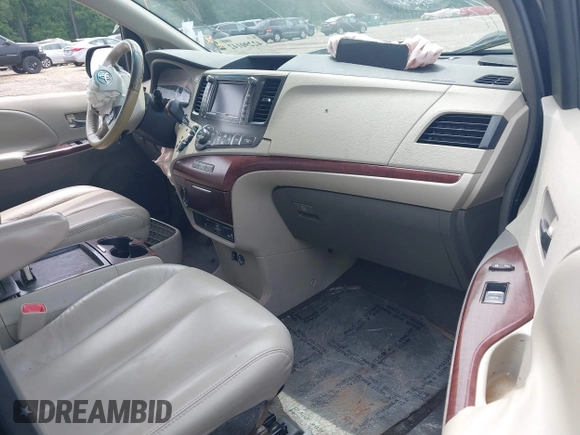 2011 Toyota Sienna XLE AAS with VIN 5TDYK3DC3BS103531, listed as a IAAI auction lot 42290142 with 231,995 mi miles and . Bid and sale history available at DreamBid. Image 5.