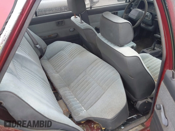1990 Nissan Sentra z VIN JN1GB21B5LU503902, wystawiony jako IAAI lot #42358723 z przebiegiem 172 484 mil mil oraz . Historia ofert i sprzedaży dostępna na DreamBid. Obrazek 8.