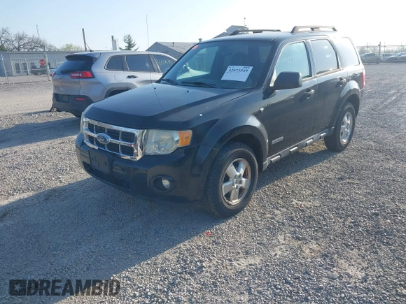 2008 Ford Escape XLT with VIN 1FMCU93138KD65438, listed as a IAAI auction lot 42073549 with 185,343 mi miles. Bid and sale history available at carsss.com. Image 2.