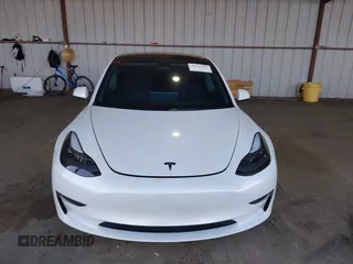 2021 Tesla Model 3 Performance with VIN 5YJ3E1EC4MF097993, listed as a IAAI auction lot 41366615 with 30,735 mi miles and . Bid and sale history available at DreamBid. Image 12.