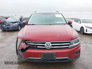 2018 Volkswagen Tiguan S with VIN 3VV1B7AX8JM124827, listed as a IAAI auction lot 41544321 with 101,492 mi miles and . Bid and sale history available at DreamBid. Image 12.
