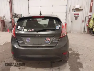 2015 Ford Fiesta SE z VIN 3FADP4EJ8FM138306, wystawiony jako IAAI lot #41227124 z przebiegiem 106 741 mil mil oraz . Historia ofert i sprzedaży dostępna na DreamBid. Obrazek 16.