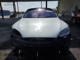 2017 Tesla Model S 100D z VIN 5YJSA1E21HF229936, wystawiony jako Copart lot #54734955 z przebiegiem 125 511 mil mil oraz Szkoda całkowita • Salvage title. Historia ofert i sprzedaży dostępna na DreamBid. Obrazek 5.