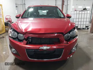2013 Chevrolet Sonic LT with VIN 1G1JC6SH1D4116946, listed as a IAAI auction lot 41562425 with 116,815 mi miles. Bid and sale history available at carsss.com. Image 6.