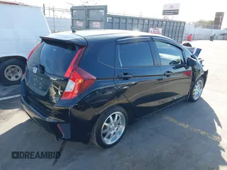 2015 Honda Fit LX z VIN 3HGGK5H57FM717203, wystawiony jako IAAI lot #41615075 z przebiegiem 99 933 mil mil oraz . Historia ofert i sprzedaży dostępna na DreamBid. Obrazek 4.
