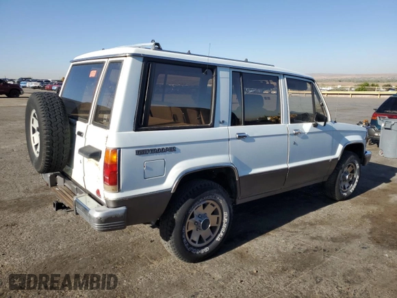 1990 Isuzu Trooper с VIN JACCH58R2L8912963, выставлен на аукционе Copart как лот 53236865 с пробегом 206 634 миль миль и Чистый • Clean title. История ставок и продаж доступна на DreamBid. Изображение 3.
