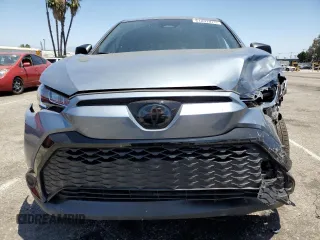 2024 Toyota Corolla Cross Hybrid S with VIN 7MUFBABG3RV043770, listed as a Copart auction lot 61007075 with 15,945 mi miles and Salvage title. Bid and sale history available at DreamBid. Image 5.