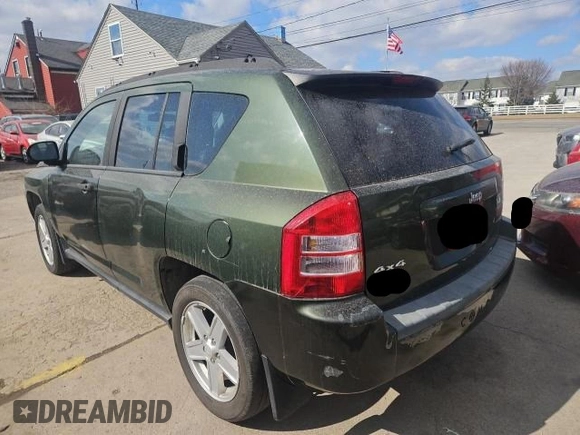 2007 Jeep Compass Sport with VIN 1J8FF47W57D122584, listed as a Copart auction lot 48618505 with 130,171 mi miles and Clean Title. Bid and sale history available at carsss.com. Image 3.