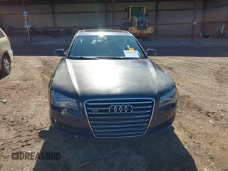 2011 Audi A8 with VIN WAURVAFDXBN014290, listed as a IAAI auction lot 40860777 with 152,584 mi miles and . Bid and sale history available at DreamBid. Image 12.