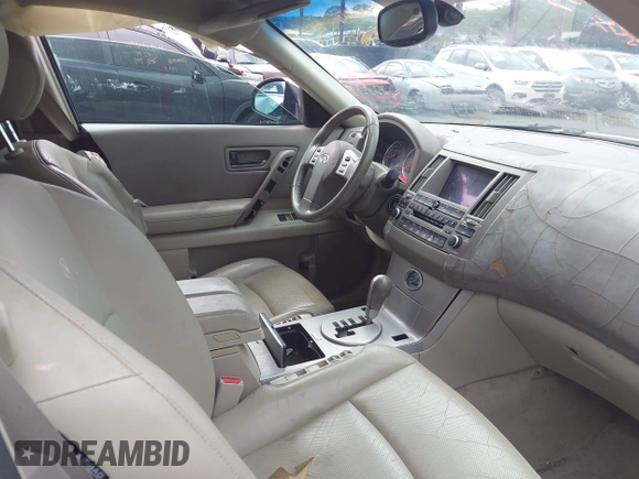 2004 Infiniti FX35 with VIN JNRAS08U54X105281, listed as a IAAI auction lot 41785353 with 121,231 mi miles. Bid and sale history available at carsss.com. Image 5.