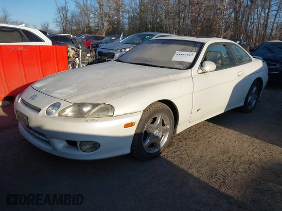1997 Lexus SC 300 with VIN JT8CD32Z4V0040389, listed as a IAAI auction lot 41446823 with Not provided miles and . Bid and sale history available at DreamBid. Image 2.