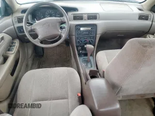2001 Toyota Camry CE z VIN 4T1BG22K71U032545, wystawiony jako Copart lot #60883095 z przebiegiem 199 864 mil mil oraz Czysty tytuł • Clean title. Historia ofert i sprzedaży dostępna na DreamBid. Obrazek 8.